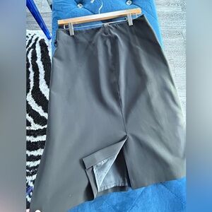 Prada skirt, front & side slits, buckle detail, belt loops, side zip closure